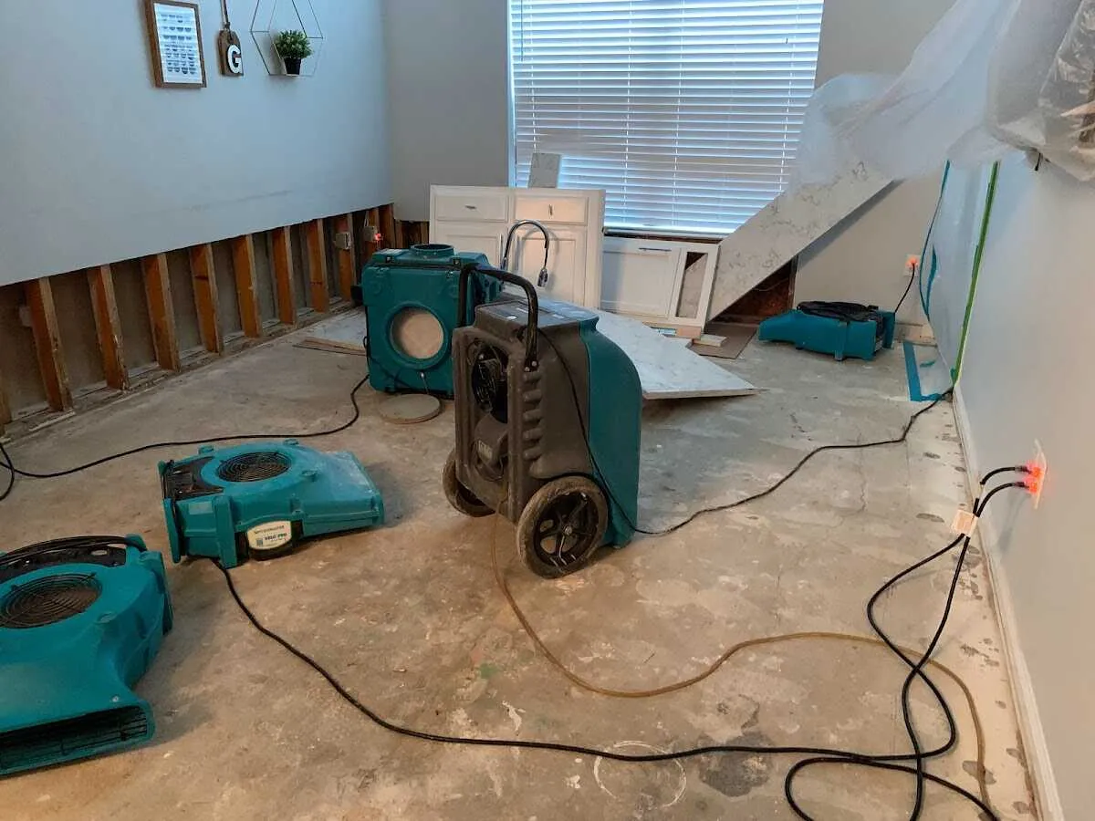 Dehumidifier in flood-cut room for Water Damage Restoration in Claymont